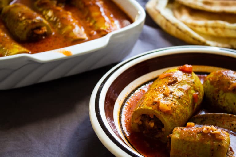 Stuffed courgettes in tomato sauce